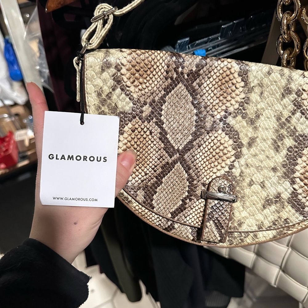 Half moon snakeskin bag